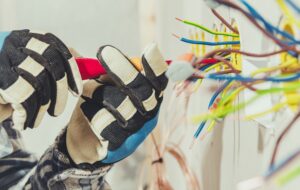 Licensed electrician providing emergency electrical repair services during a sudden home power outage